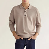 Light gray men's long sleeve knit polo sweater in a relaxed fit, featuring a persimmon color for the 3XL size. The image highlights the sweater's soft jersey texture and details such as the arm, neck, and sleeve design.