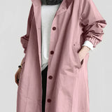 Light gray women's oversized double-breasted trench coat with a rose hue, featuring a classic collar, long sleeves, and an elegant fashion design, suitable for 3XL size.