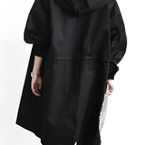 Light gray women's oversized double-breasted trench coat featuring a classic collar, long sleeves, and a tailored waist.