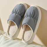 Women's light green quilted padded insulated winter slippers in gray, size 42, designed for comfort and warmth with a synthetic rubber sole suitable for outdoor use.
