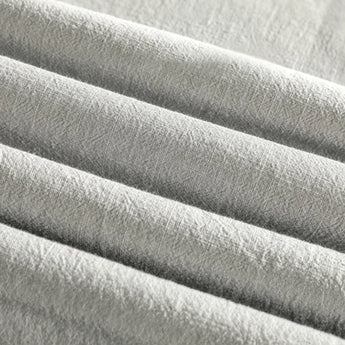 Light grey men's short sleeve linen dress shirt with mandarin collar, breathable fabric, close-up view.