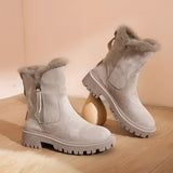 Ankle-length light grey suede winter boots with a chunky sole, featuring a fur lining for warmth and comfort.