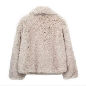 Light grey women's faux fur winter coat featuring a plush, woolen texture with a stylish collar and sleeves.