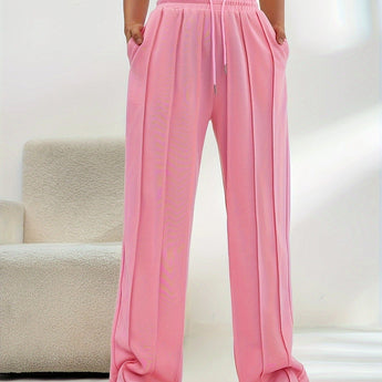 Light pink high-waist joggers for women in size XXL, featuring a stylish design with a comfortable fit around the waist and legs.