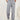 Light pink high-waist joggers showcasing a comfortable fit, styled for women in a fashionable design. Model wearing gray variant, size XXL, highlighting the waist and thigh areas, paired with a blazer.