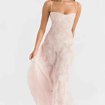 Light pink lace floral gown with elegant detailing, suitable for romantic summer evenings. The dress features a flattering neckline, fitted waist, and delicate sleeves, creating a graceful silhouette.