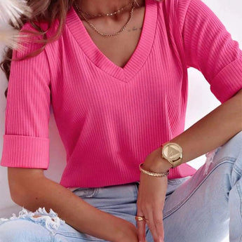 Light pink V-neck ribbed sweater for women, casual spring fashion, modeled in deep pink, size 3XL, showcasing sleeve and shoulder details.