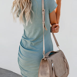 Women's casual short sleeve light teal summer dress with a relaxed fit, shown on a white background.
