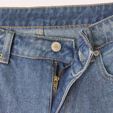 Light-wash high-waist denim jeans in faded blue, featuring a classic five-pocket design.