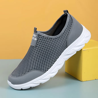 Lightweight breathable slip-on walking shoes in gray, featuring an athletic sneaker design ideal for outdoor activities. The shoes are shown in size 46.
