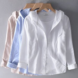 Lightweight breathable striped linen shirt with long sleeves and a button-down collar on a clothes hanger suitable for casual and office wear.