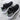 Lightweight black and white striped mesh running shoes with a non-slip sole, available in size 40.
