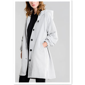 Lightweight women's hooded gray trench coat with button-up front, featuring long sleeves and a stylish collar, suitable for spring weather.