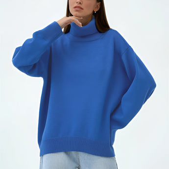 Lime green chunky knit turtleneck sweater worn by a person, showcasing the cozy texture and thick fabric ideal for winter fashion, with emphasis on the long sleeves and fitted waist.