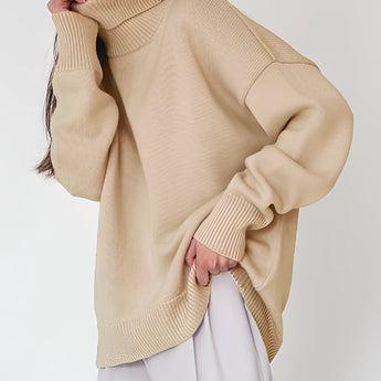 A lime green chunky knit turtleneck sweater, showcasing cozy winter fashion with long sleeves and a high collar, displayed on a mannequin with a white background.