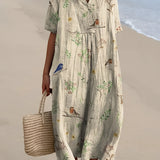 Women's linen bird print V-neck midi dress designed as casual beachwear kaftan, shown in a dressing gown style with 3XL size, featuring long sleeves and a patterned fabric suitable for a stylish, relaxed look by the water.