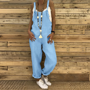 Women's linen jumpsuit in blue sky color, featuring a casual boho chic design, short sleeves, and a comfortable fit suitable for summer wear.