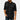 A man wearing a relaxed-fit black linen shirt paired with jeans, showcasing a casual, lightweight summer style.