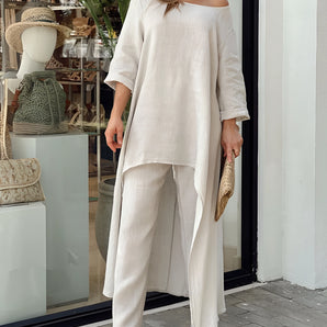 Beige linen tunic dress and pants set in size 2XL featuring a bohemian chic design with a relaxed fit, long sleeves, and a simple collar suitable for summer fashion.