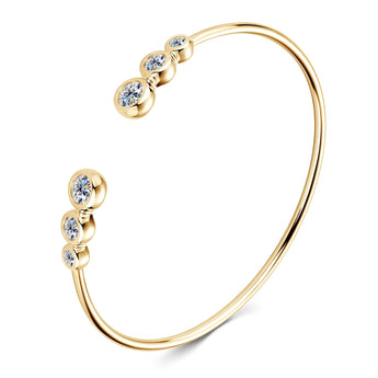Elegant gold moissanite bracelet featuring luxury synthetic diamonds with an oval-shaped gemstone design and metallic finish.