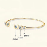 Elegant gold moissanite bracelet with synthetic diamonds, luxury jewelry accessory.