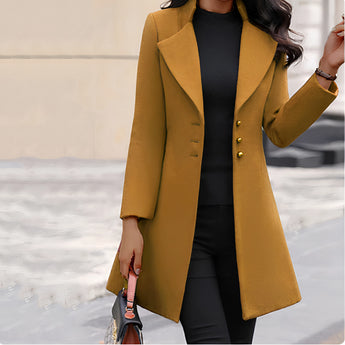 Long black slim fit women's coat with elegant design, featuring a structured shoulder, full-length sleeves, and a defined waistline, suitable for winter wear.