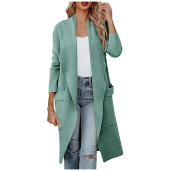 Women's long camel coat with a waterfall open front design in green, size 2XL. The model showcases the stylish autumn trench, highlighting the shoulder, neck, sleeve, and waist features, complemented by a fashionable collar. The outfit is accessorized with sunglasses, enhancing the sophisticated look.