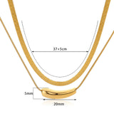 Luxurious double layer gold necklace featuring minimalist design with delicate circular pendants, versatile choker style suitable for any occasion.