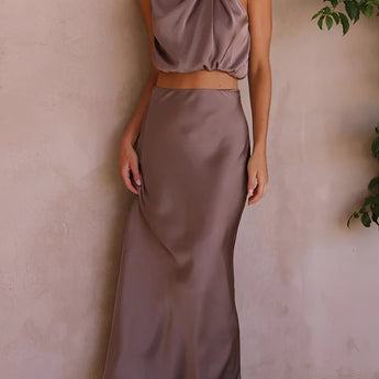 Luxurious silk satin skirt set featuring a high-waist maxi skirt and a backless halter top in a vibrant viola color, suitable for XL size.