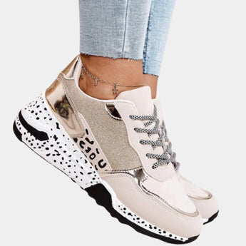 Luxurious women's designer sneakers in white with animal print and metallic gold accents, size 42, featuring a fashionable design suitable for sportswear and walking.