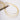Elegant 18K gold-plated snake chain necklace with sleek design, showcasing luxurious and waterproof body jewelry accessory.