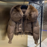 Luxury designer winter fashion puffer jacket with black fur collar in a rich brown color, size large.