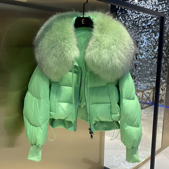 Luxury black puffer jacket with a plush fur collar, showcased in a green color variant, designed for winter fashion.
