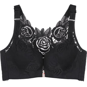 Luxury black lace bralette featuring intricate floral embroidery, wire-free design, and adjustable straps.