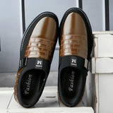 Luxury black leather men's formal shoes with a designer checkered pattern, showcasing a sleek and elegant design suitable for formal occasions. The shoes highlight a comfortable fit and high-quality craftsmanship, perfect for elevating any gentleman's fashion ensemble.