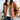 Luxury brown suede jacket with shearling collar, highlighting its stylish outerwear design. The jacket features long sleeves, a structured shoulder, and a fitted waist, making it a fashionable choice for winter.