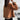 Luxury brown suede jacket with a plush shearling collar, showcasing the shoulder, neck, sleeve, and waist areas, emphasizing comfort and winter fashion style.
