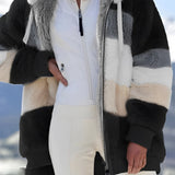 Luxurious designer striped fur winter coat featuring a stylish collar, long sleeves, and convenient pockets. The coat showcases a sophisticated blend of white and grey hues, providing warmth and elegance. The length extends to the thighs, offering a fashionable look that is both functional and chic.