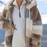 Luxury designer striped fur winter coat in polar brown, featuring long sleeves, a plush collar, and spacious pockets, displayed in a 3XL size, highlighting its elegant design and natural materials.