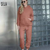 Luxurious fleece loungewear set in plush beige, featuring a comfortable teddy co-ord outfit with long sleeves and a relaxed fit, perfect for cozy lounging.