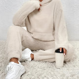 Plush beige teddy co-ord loungewear set in apricot, featuring a cozy fleece texture with a collared top and long sleeves, designed for comfort and style in size 2XL.