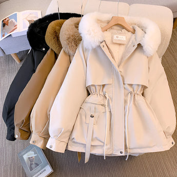 Luxury women's winter parka with fur-trimmed collar and beige color, featuring a stylish design with long sleeves and elegant tailoring.