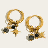 Luxury gold hoop earrings with pearl charms, featuring a star pendant and black bead, designed by YA-CHAN.