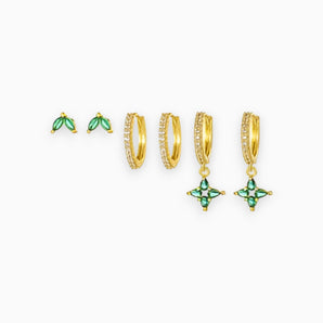 Luxurious gold hoop earrings featuring charming star motifs and a striking green gemstone, designed as a fashionable accessory to enhance any look.