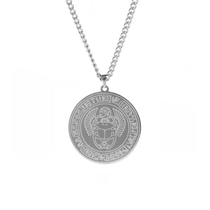 Luxury gold and silver zodiac pendant necklace with personalized celestial design, featuring a circular metal pendant on a delicate chain.