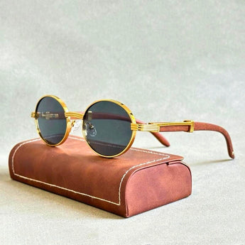 Luxury gold vintage round sunglasses featuring designer eyewear style, Ametista variant, with tinted lenses and a sleek, stylish frame.