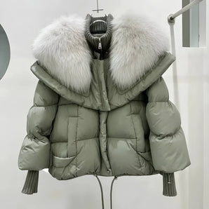 Luxury green puffer jacket with faux fur hood, large size, featuring long sleeves and a stylish collar design.