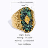 Luxury green gemstone ring with textured 18K gold band by YA-CHAN, adorned with an elegant natural gemstone and intricate metalwork.
