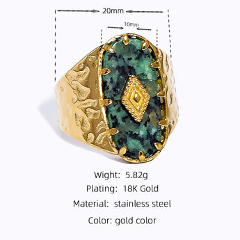 Luxury green gemstone ring with textured 18K gold band by YA-CHAN, adorned with an elegant natural gemstone and intricate metalwork.