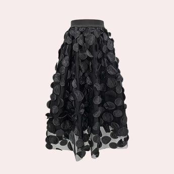 Luxury high-waist black skirt featuring a detailed 3D floral design, showcasing intricate patterns with a stylish and elegant appearance suitable for fashion-forward women.